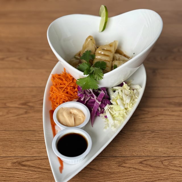 Sesame Szechuan Pork Dumplings.